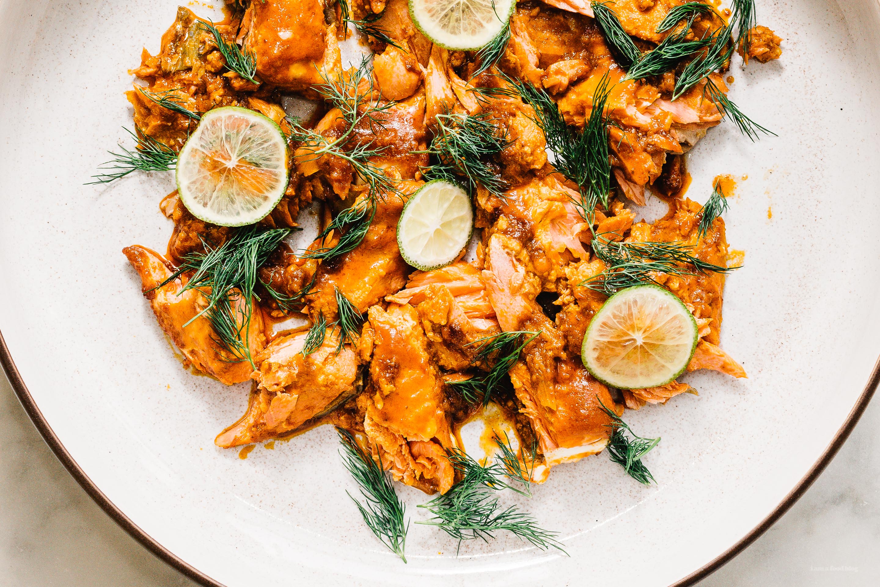 Bon Appetit’s Harissa Salmon is the Perfect Dinner Party Main