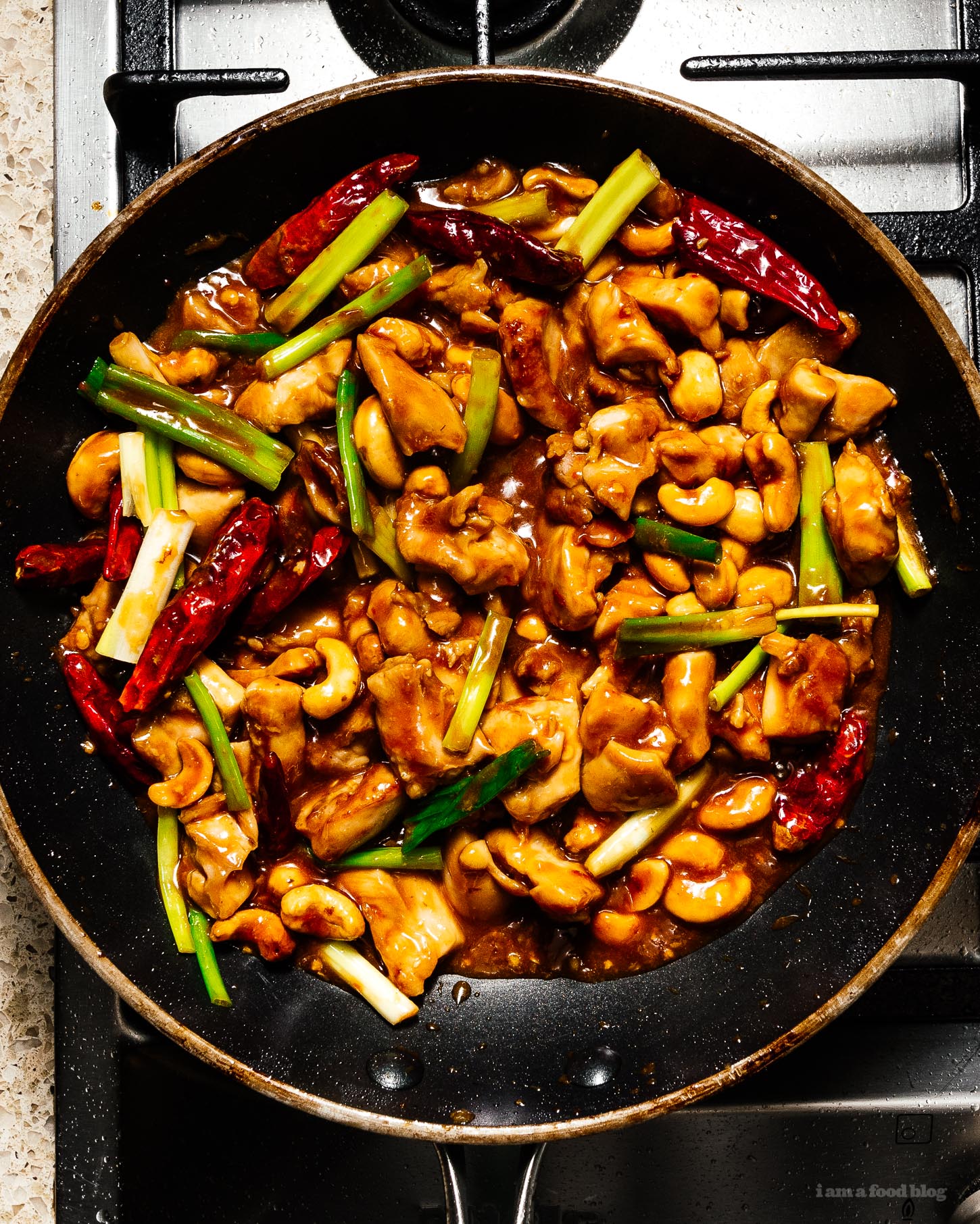 This spicy, tangy, sweet, and addictive better than takeout no peanut kung pao chicken stir fry recipe is here to brighten up your weeknight (or weekend) dinners! Highly addictive and super easy to make at home. #recipe #recipes #dinner #kungpao #kungpaorecipe #kungpaochicken #kungpaochickenrecipe #takeout #takeoutrecipes #betterthantakeout #stirfry #stirfryrecipes