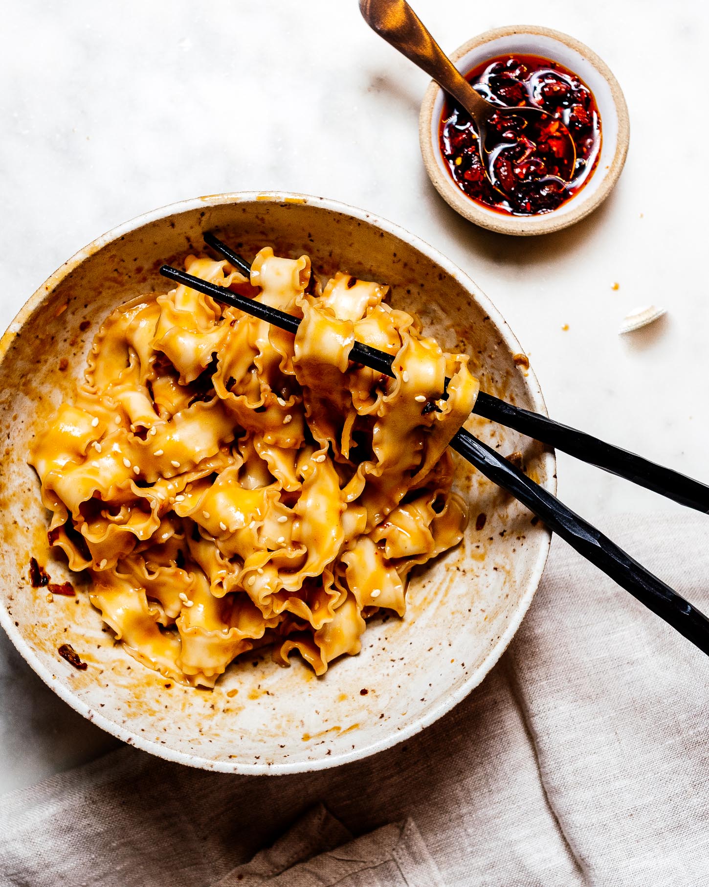 This super easy cheater’s dan dan noodles is fast, flavorful, and vegetarian to boot. It’s definitely the answer to: what’s for dinner tonight. #dandannoodles #dandan #vegetarian #noodles #chinesefood #betterthantakeout #sesamenoodles #peanutnoodles #recipes #recipe #dinner