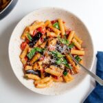 A traditional Sicilian pasta dish made with sautéed eggplant and tomatoes. Meat free, super delicious, and easy! | www.iamafoodblog.com